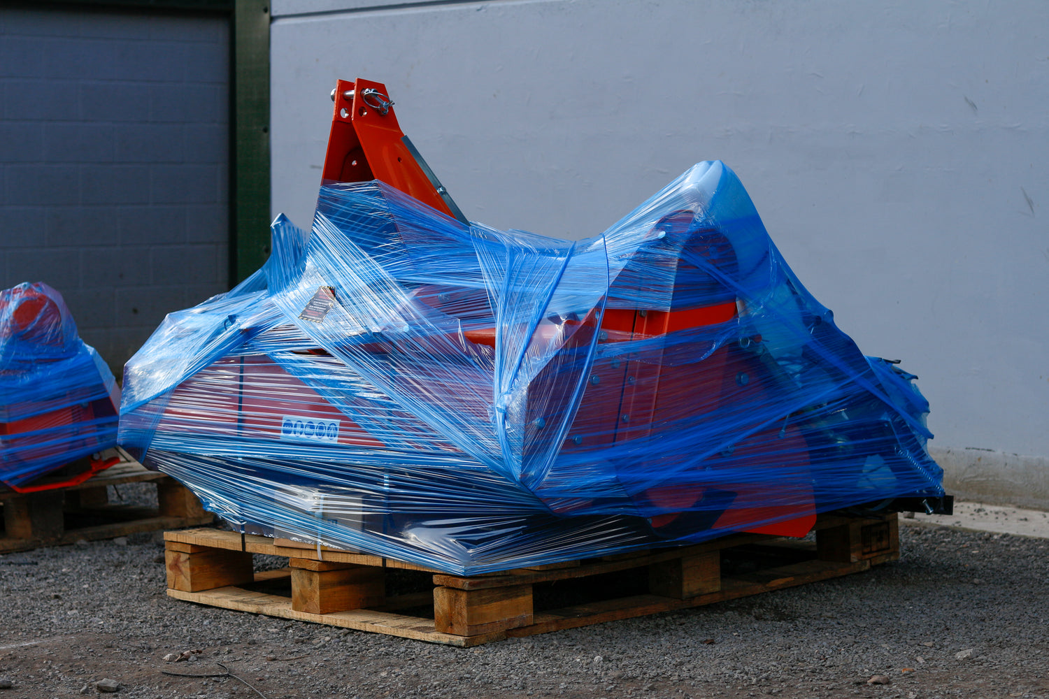 Tractor attachment on a pallet