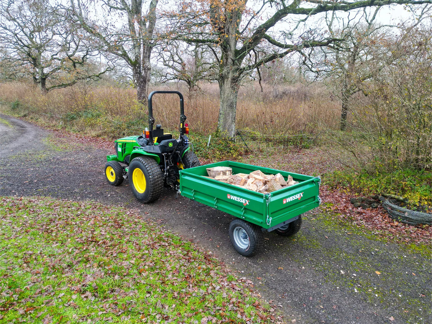 Green tractor with a Wessex tipping tractor trailer 