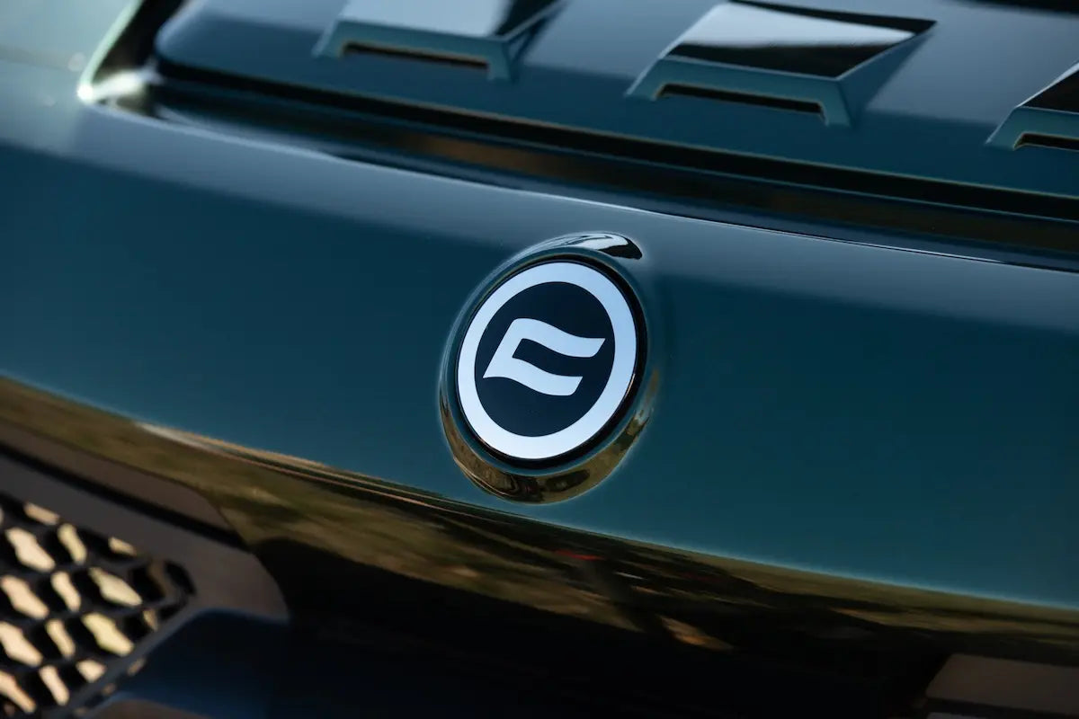 Close-up of a CFMOTO emblem on a CFMOTO U10 Pro UTV