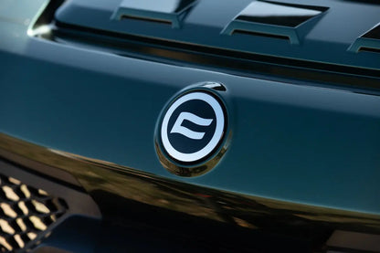 Close-up of a CFMOTO emblem on a CFMOTO U10 Pro UTV