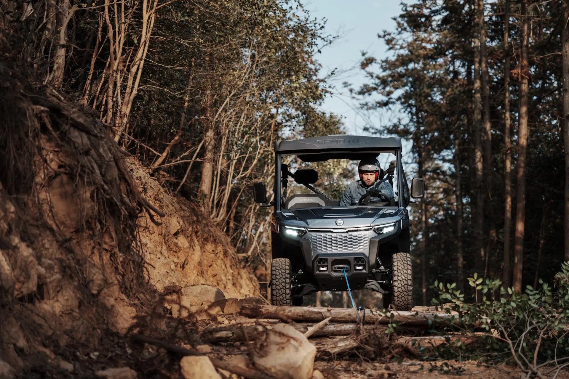 CFMOTO U6EV Electric UTV Utility vehicle on a forest trail