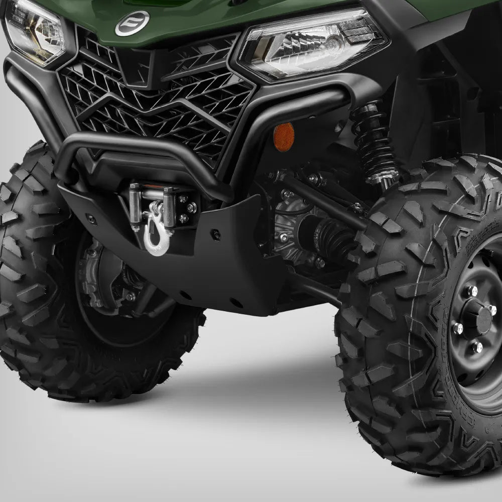 Close-up of a green CFMOTO 450 ATV with large tires on a white background