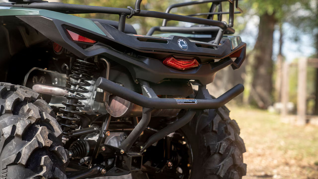 Close-up of a Can-Am ATV with a blurred natural background