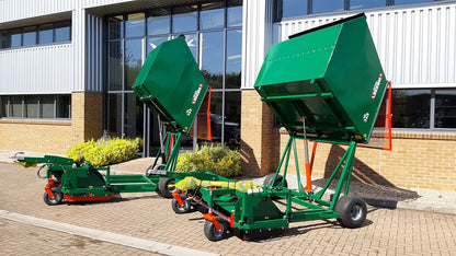 Two Wessex flail collector on a brick driveway with a building in the background